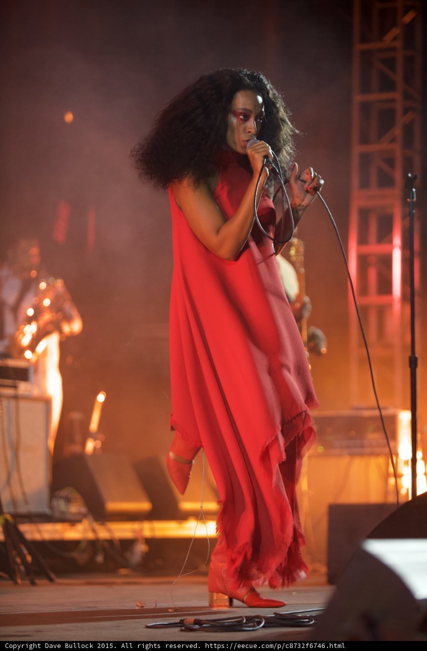 Solange Full Body Mic Cord Loop Red Outfit Saxophonist Scaffolding