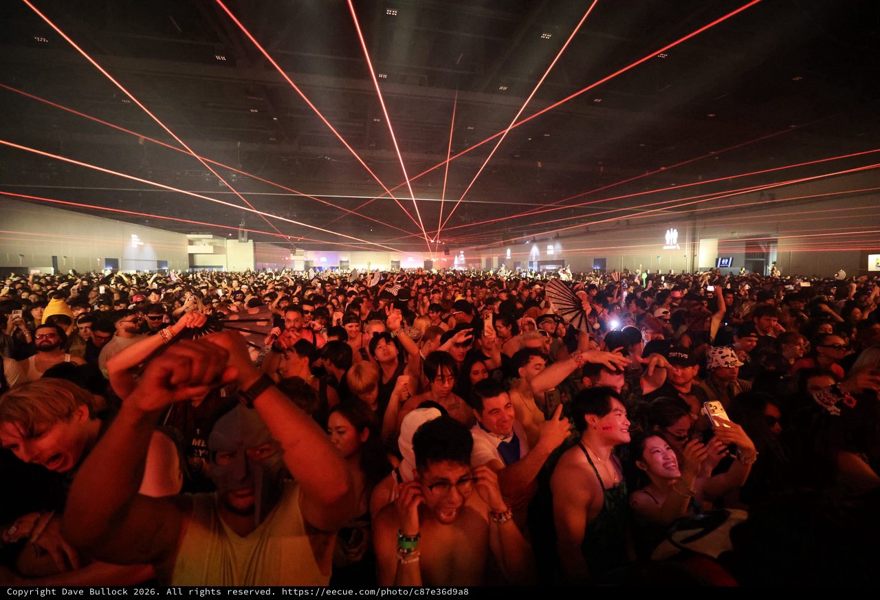 Red Laser Light Show Over Massive EDM Festival Crowd