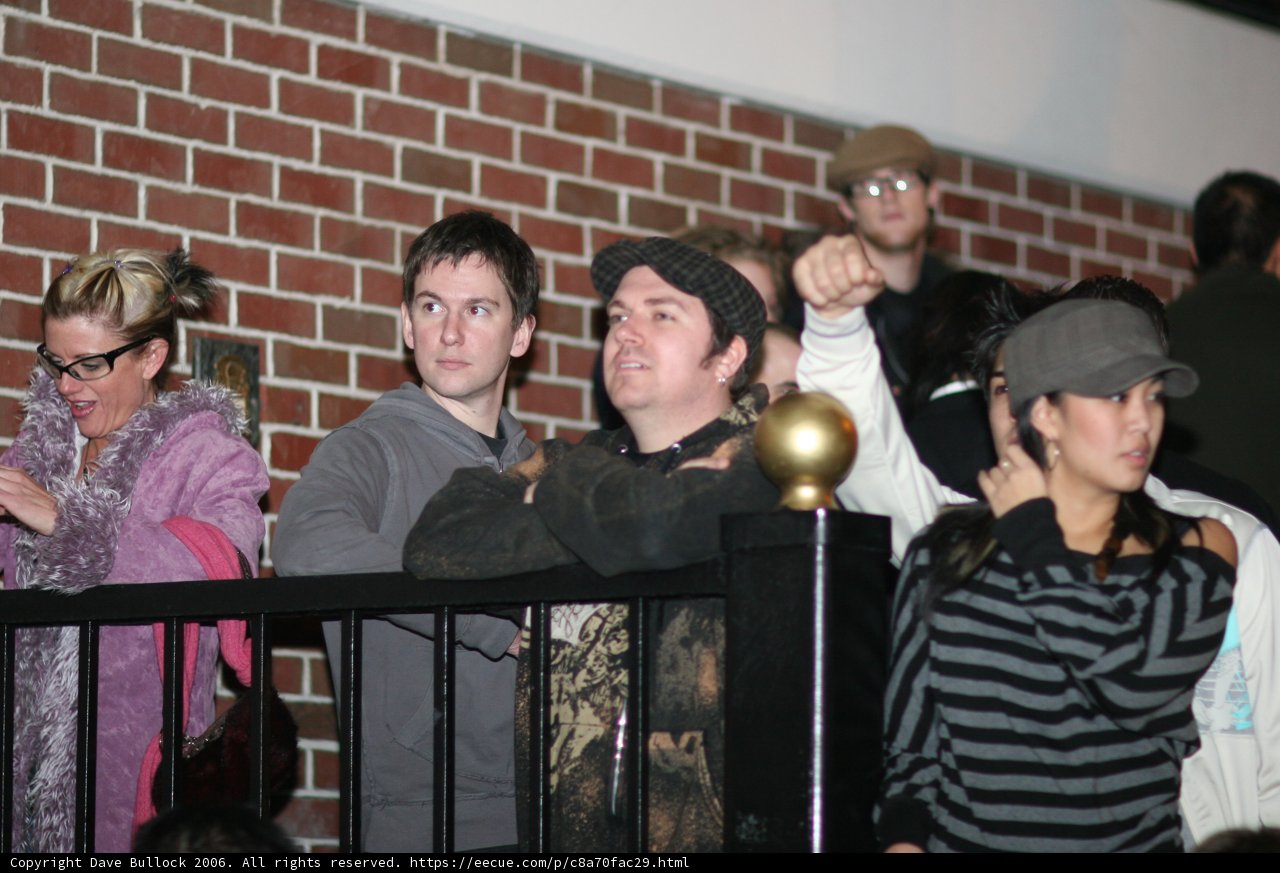 Balcony Crowd Gazing into the Urban Sphere