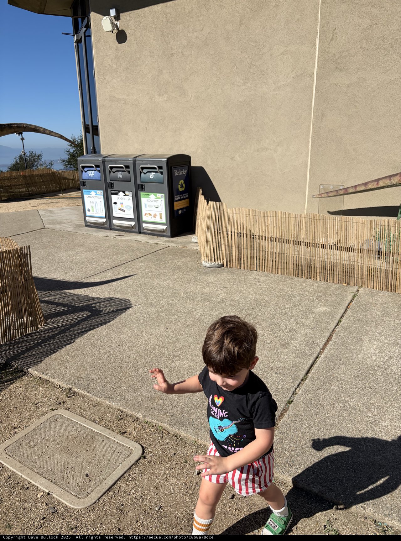 Young Child Running on Seaside Promenade
