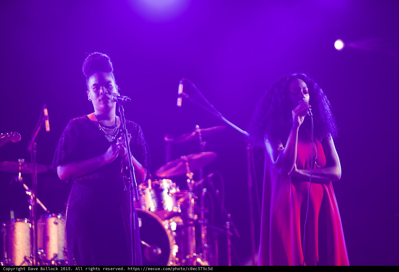Solange Red Dress And Backing Vocalist Black Dress Duet Drum Kit Purple