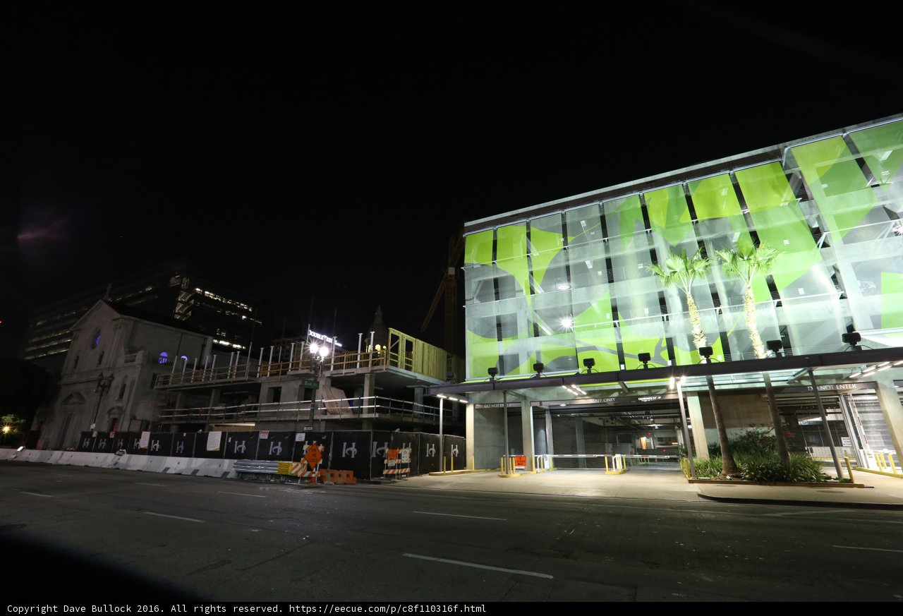 Green Glass Skyscraper Shimmers in the Night