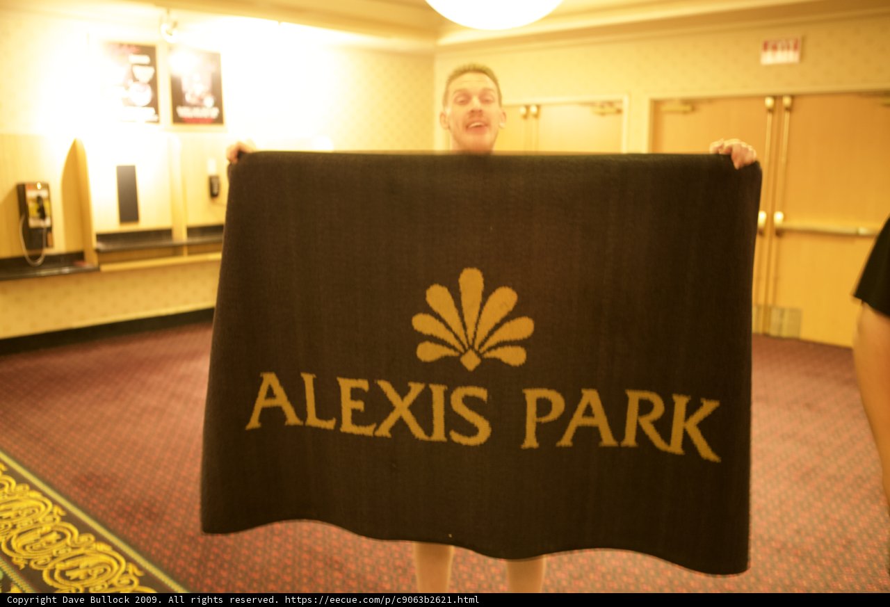Alexis Park Sign Held by a Man at DEFCON 17