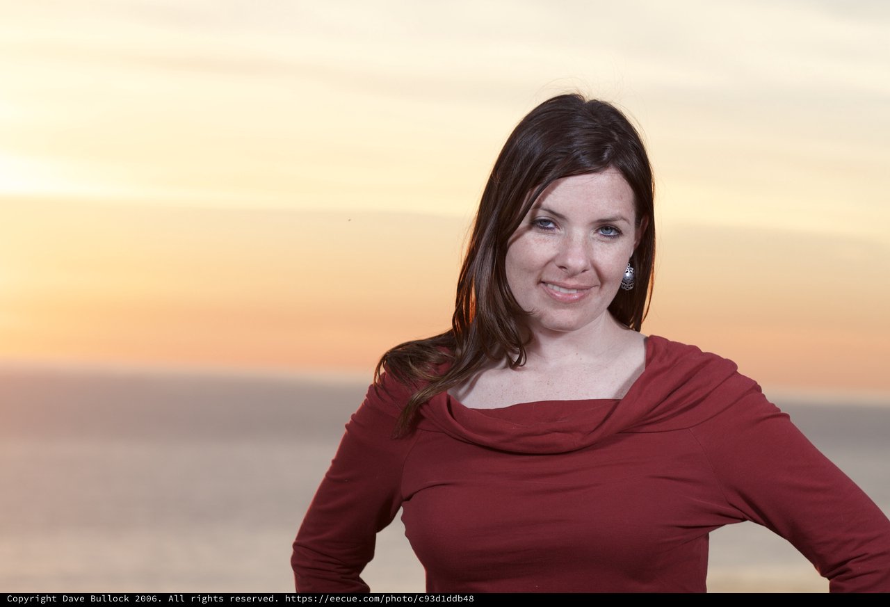 Woman in Red at Golden Hour Seaside
