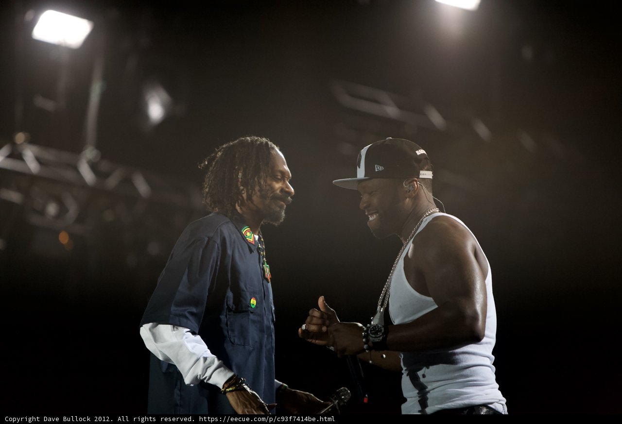 Two Men on Stage with Spotlight