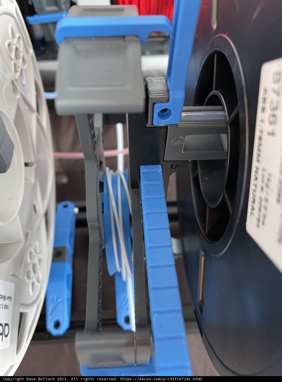 Blue and White Plastic Reel with Handle