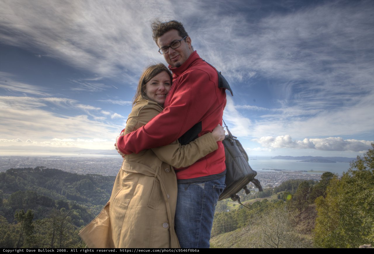Couple Embracing Atop Berkeley Hills Overlooking Bay