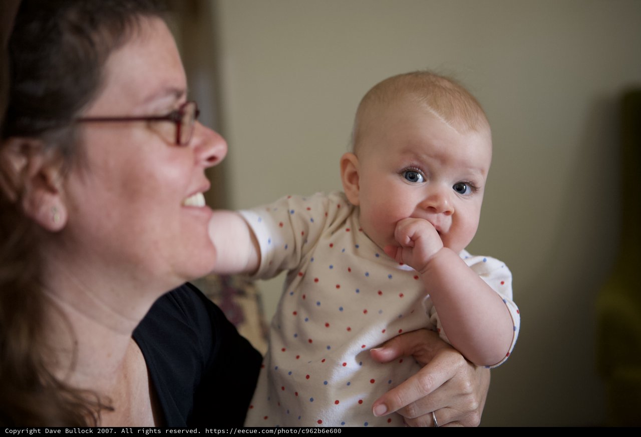 Mother and Baby Share a Joyful Moment Together