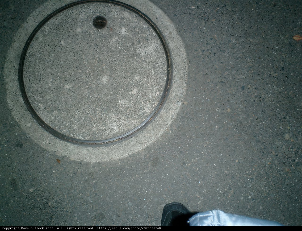 Standing by the manhole