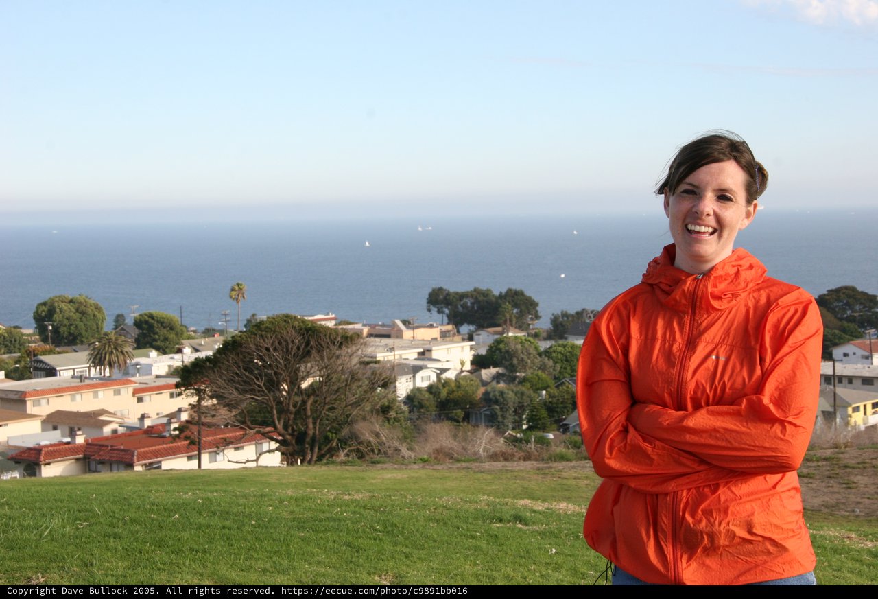 Smiling Woman Overlooking Coastal California Neighborhood