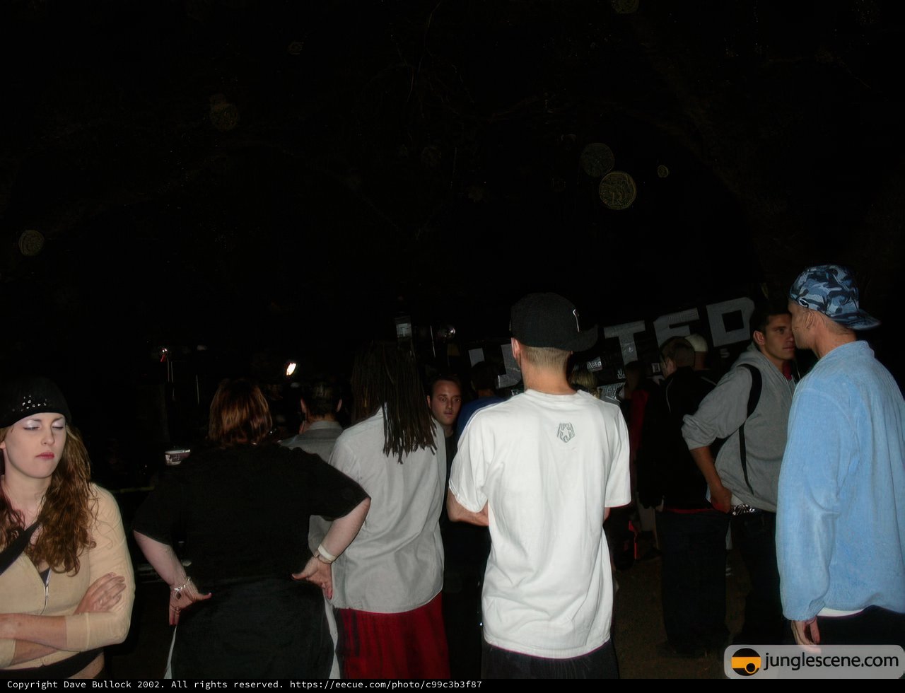 Nighttime Gathering with Baseball Caps and Urban Style