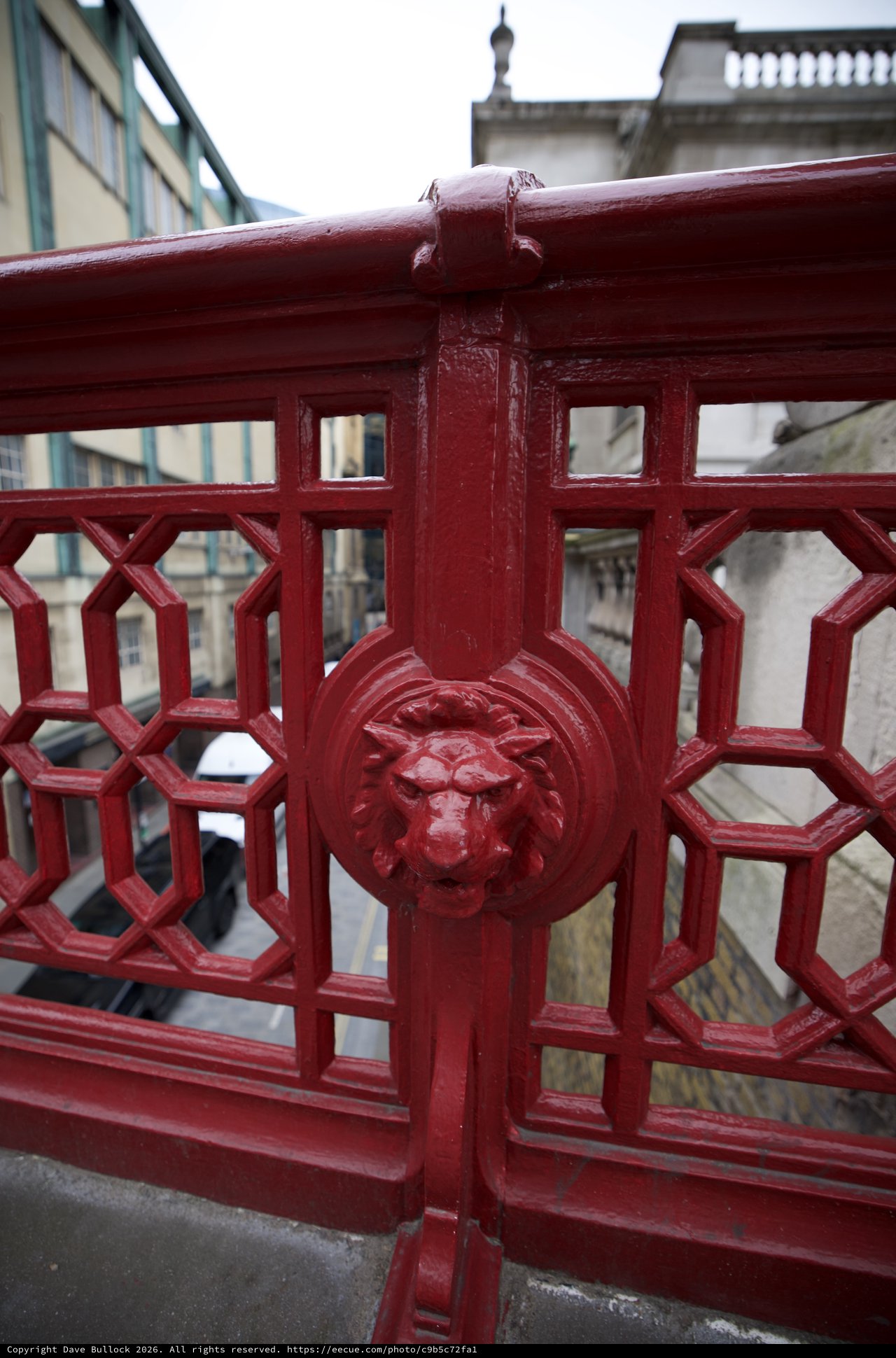 Ornate Lion Head Detail on Victorian Red Bridge Railing