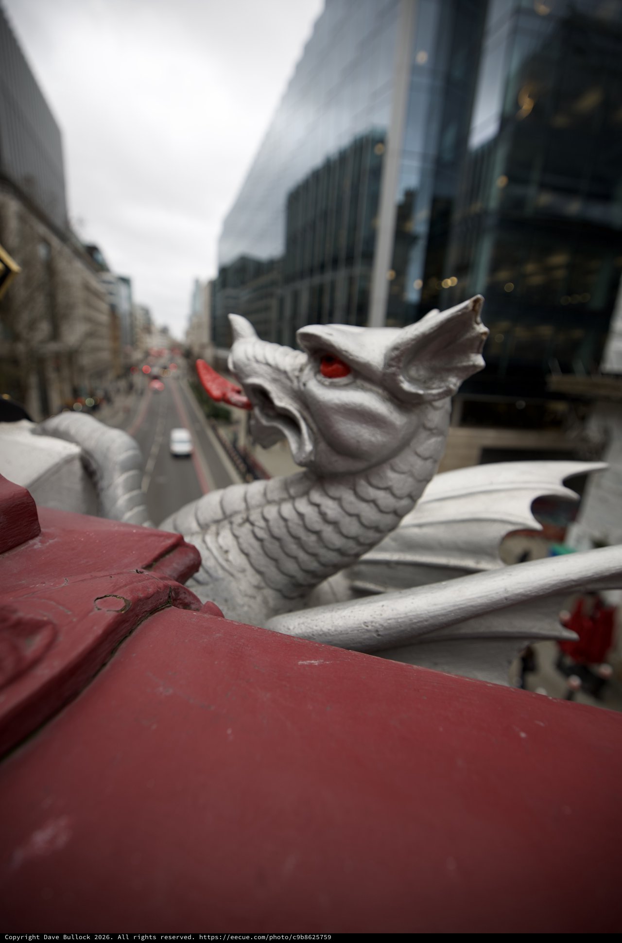 Silver Dragon Guardian Overlooking London Street