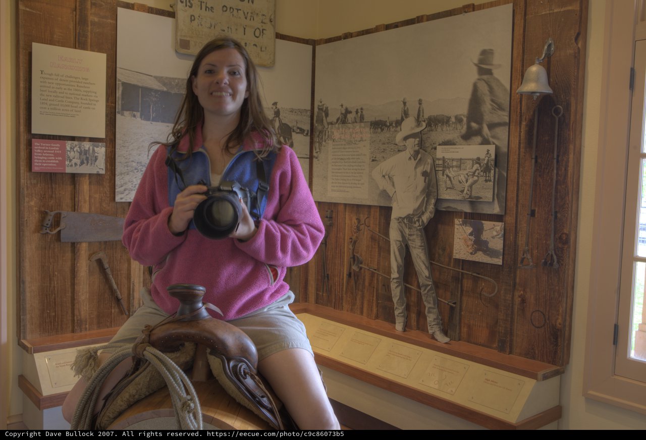 Tourist Poses on Saddle at Western Ranch Museum