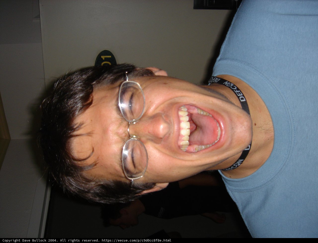 A Happy Man with Glasses