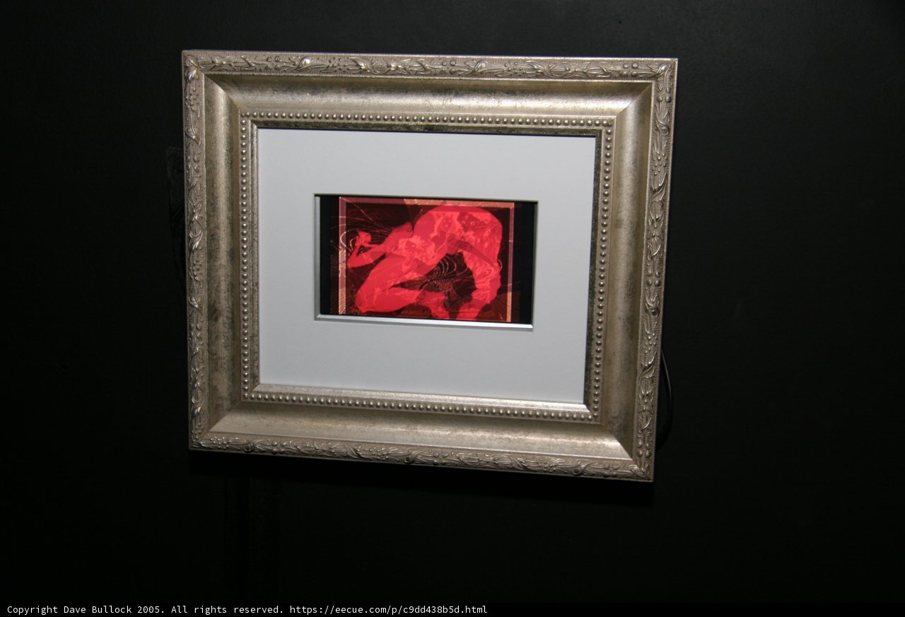 Red and Black Abstract Painting in a Frame