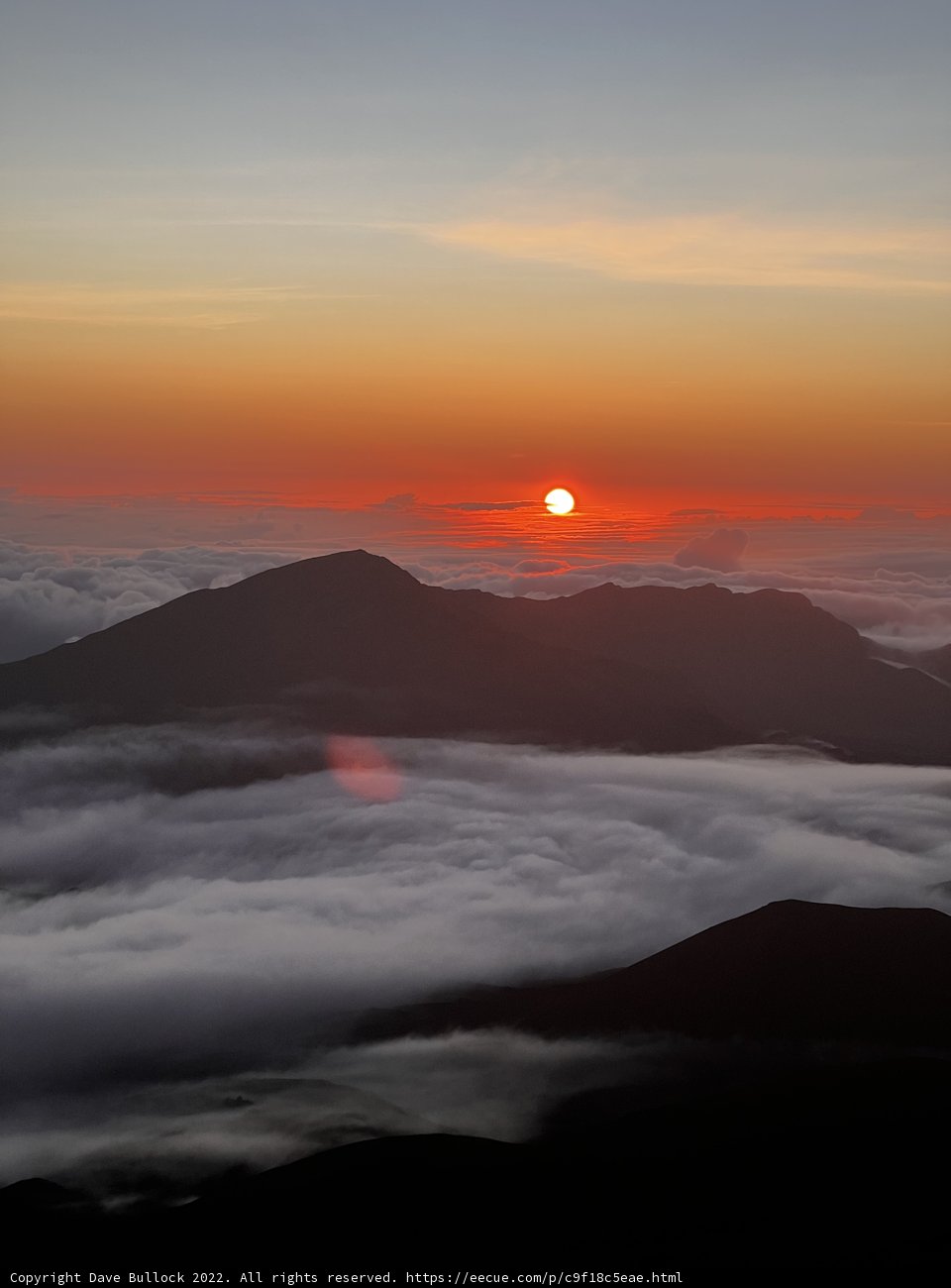 Sunrise Over the Clouds