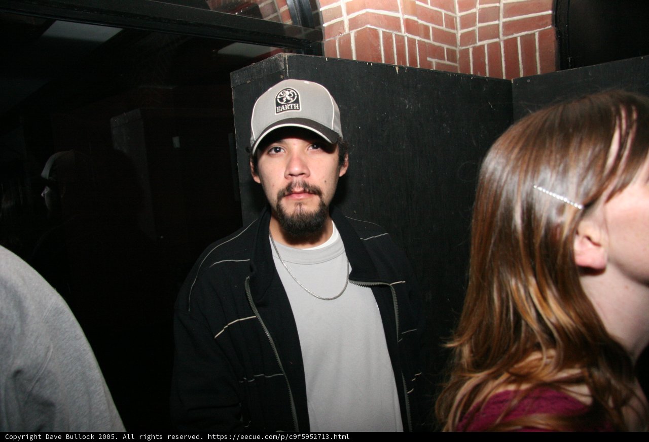 Bearded Man in Baseball Cap and Jacket