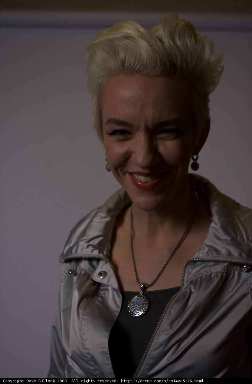 Shimmering necklace, radiant smile