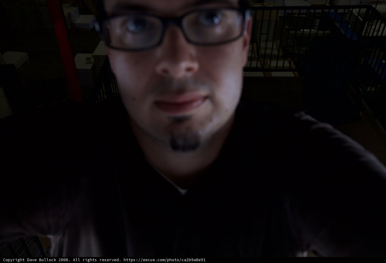 Portrait of a Man with Glasses