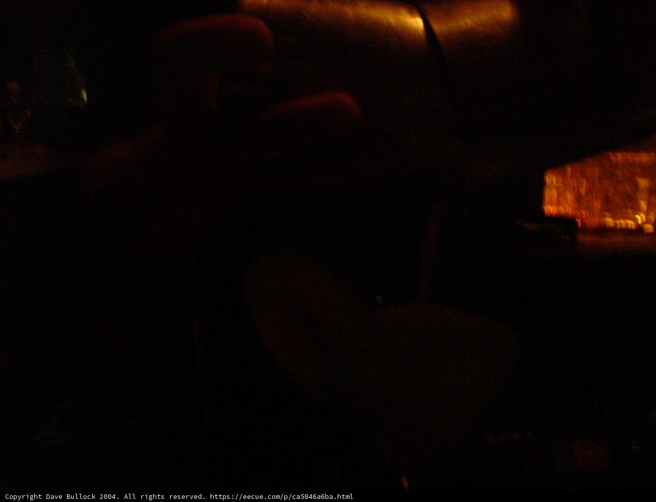 Urban Silhouette Pouring Drink at Pub