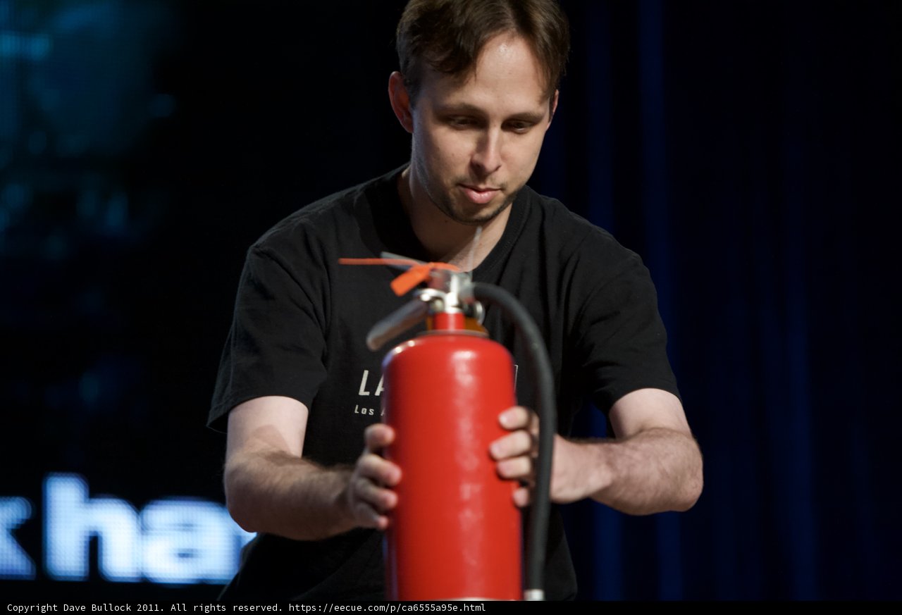 In Case of Emergency: Man With Red Fire Extinguisher