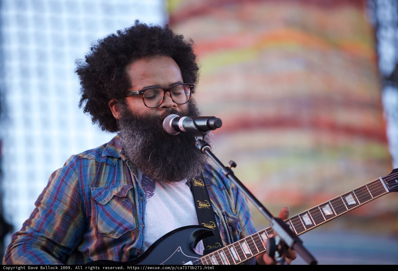 Kyp Malone rocking the stage with his electric guitar at Coachella 2009