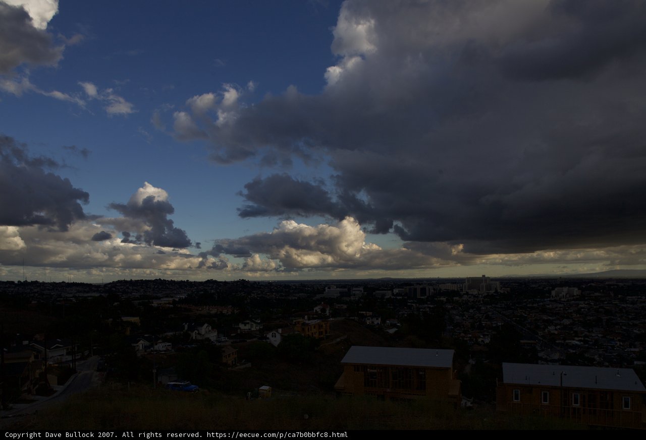 Cityscape on a Cloudy Hill