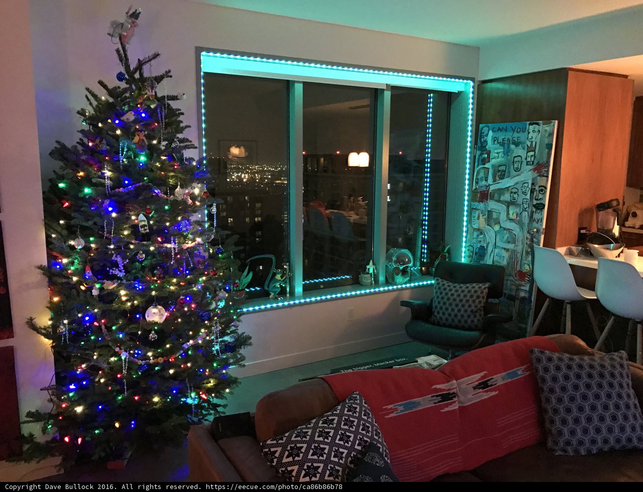 Festive Living Room with Christmas Tree and Window View