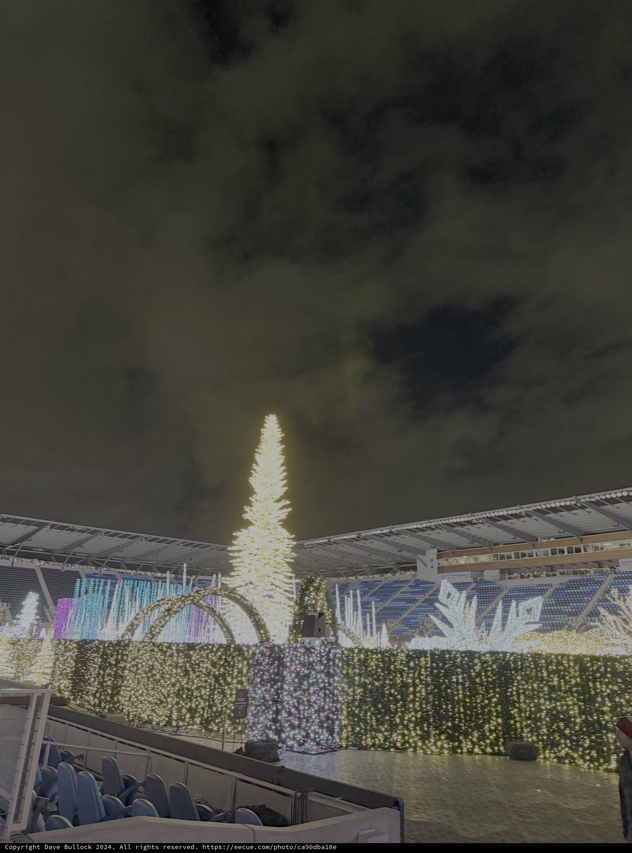 Stadium Christmas Display with Illuminated Tree and Fireworks
