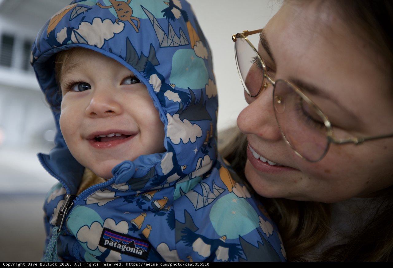 Joyful Winter Moment: Parent and Child Outdoors