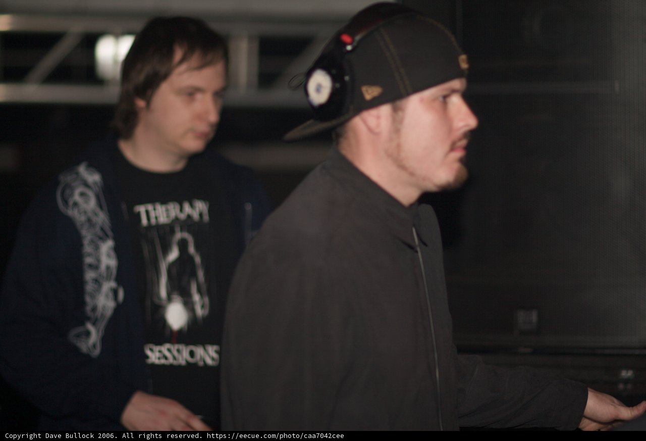 Stylish Man in Black Jacket and Baseball Cap