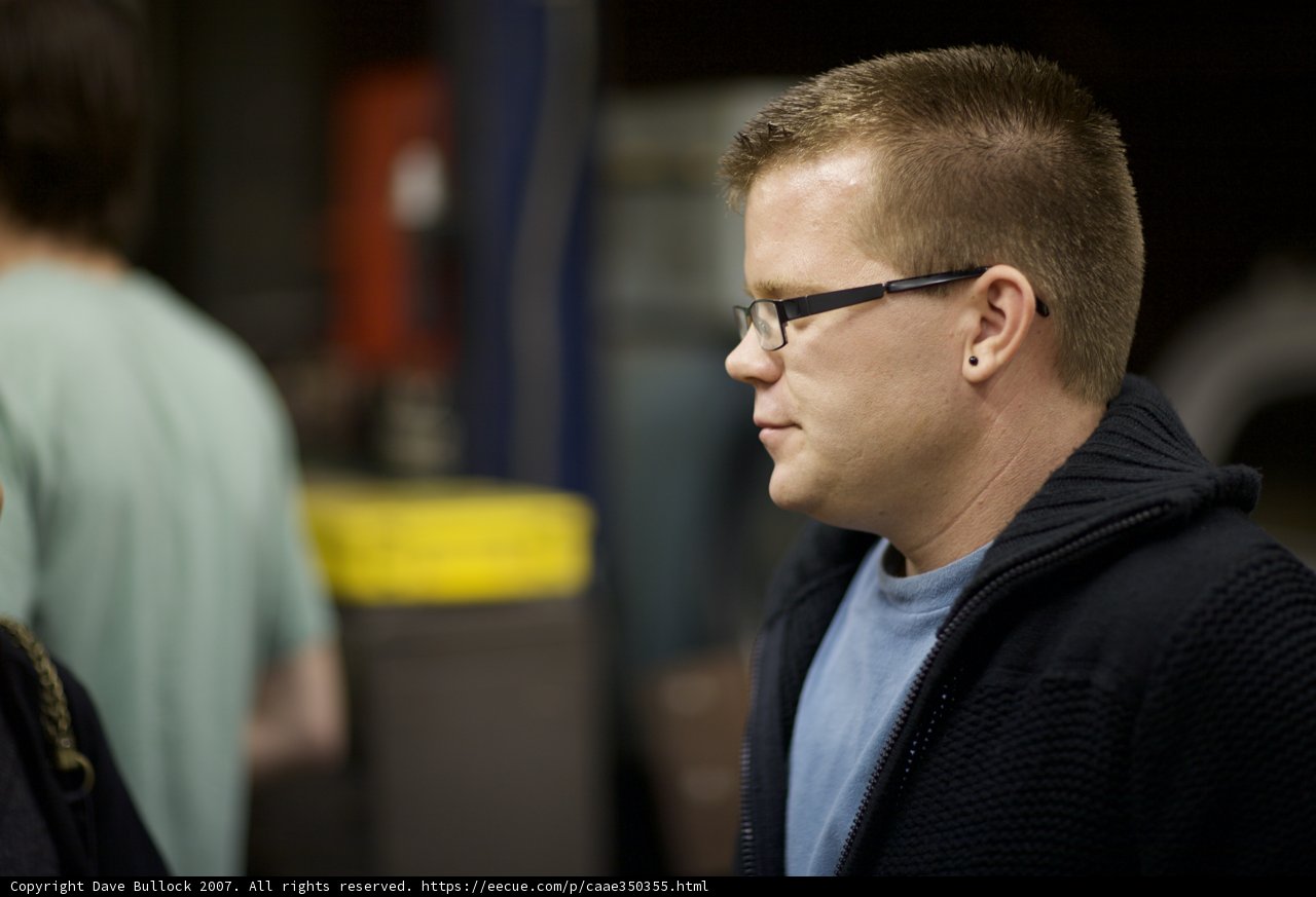 Two Men in Glasses and Jackets