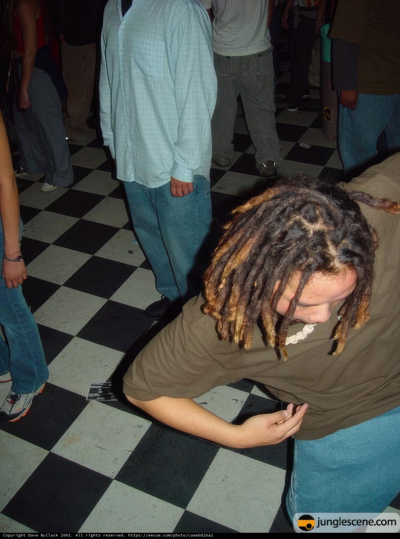 Dreadlocked man grooves to the beat