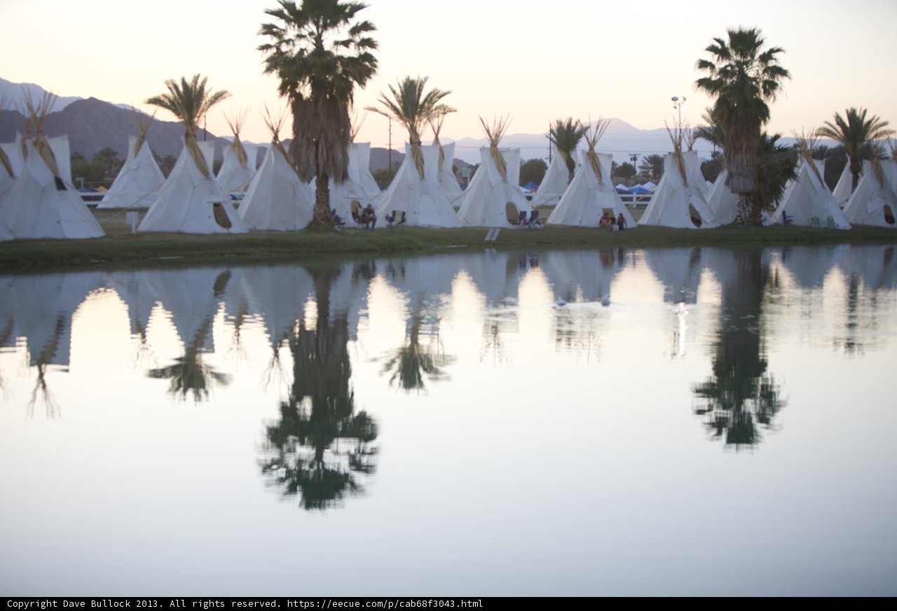 Reflections of Teepees on the Lake