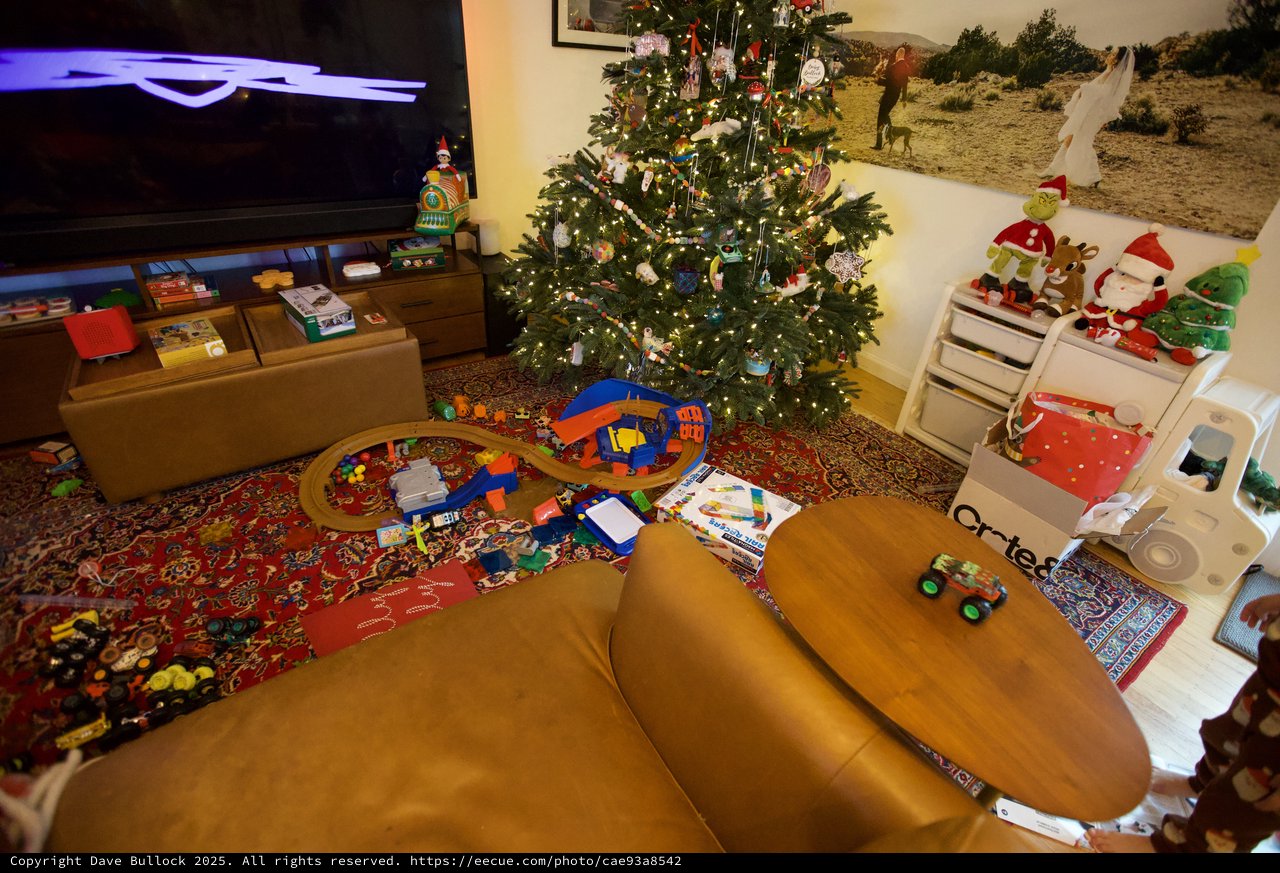 Christmas Morning Living Room with Scattered Toys and Decorations