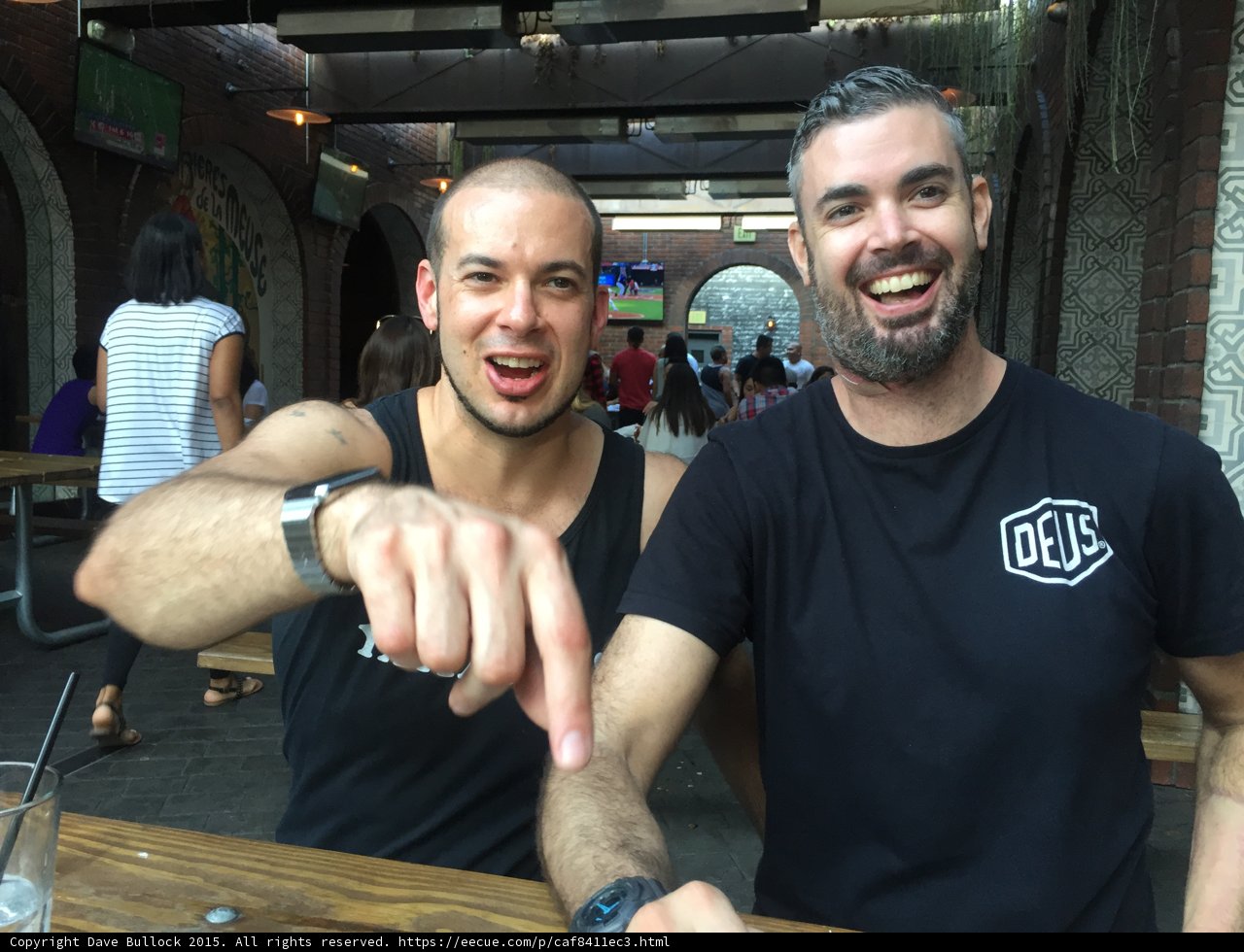 Two Men Enjoying a Casual Lunch
