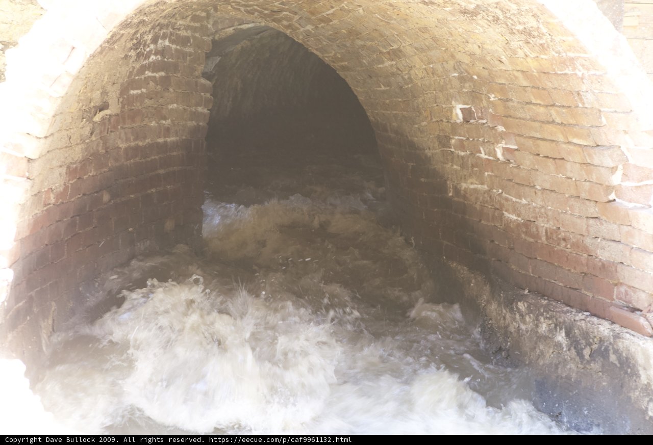 The Water-Flowing Sewer Tunnel