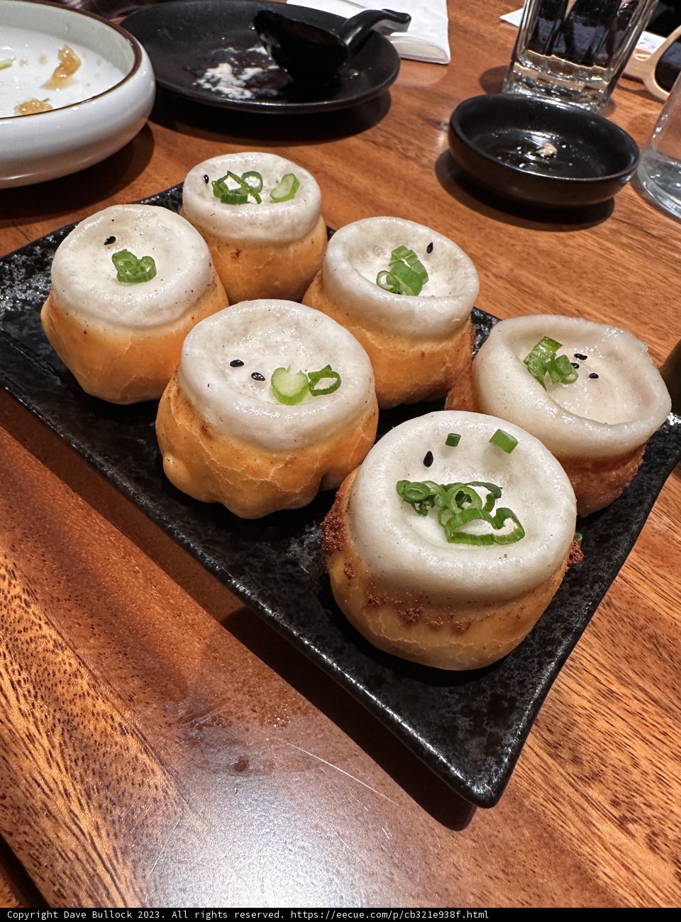 Delightful Pastries on Black Plate