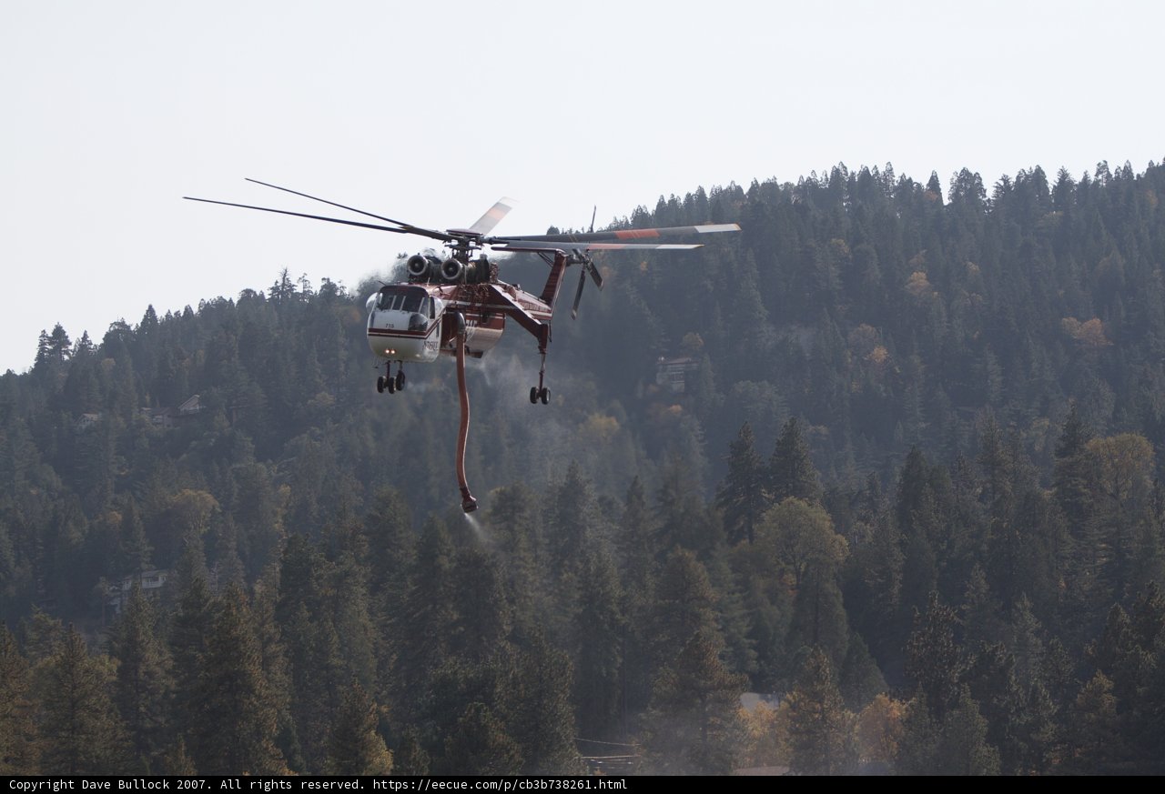 A Helicopter Fighting Flames from Above