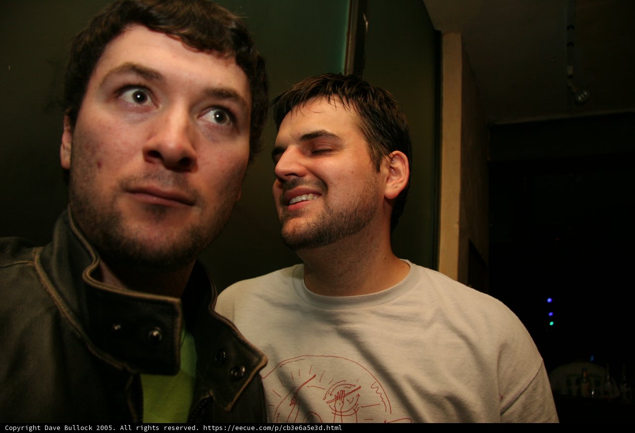 Men Strike a Pose for the Perfect Selfie