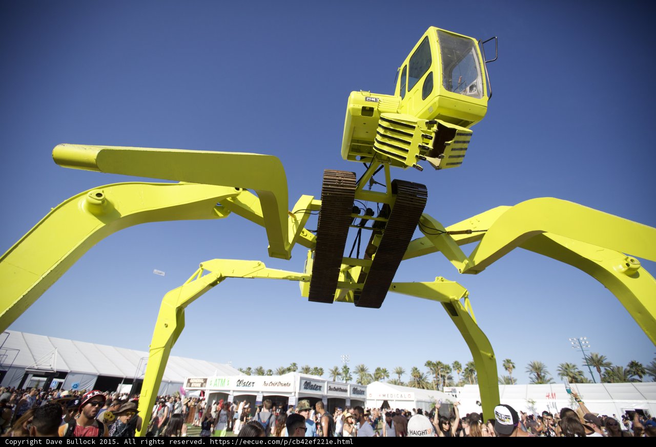 Yellow Giant Over Crowd