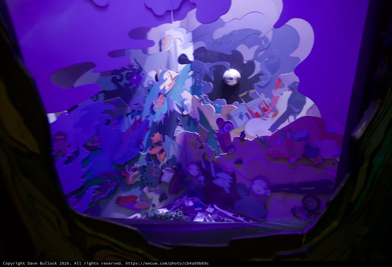 Illuminated Three-Dimensional Pop-Up Art Installation in Purple Light