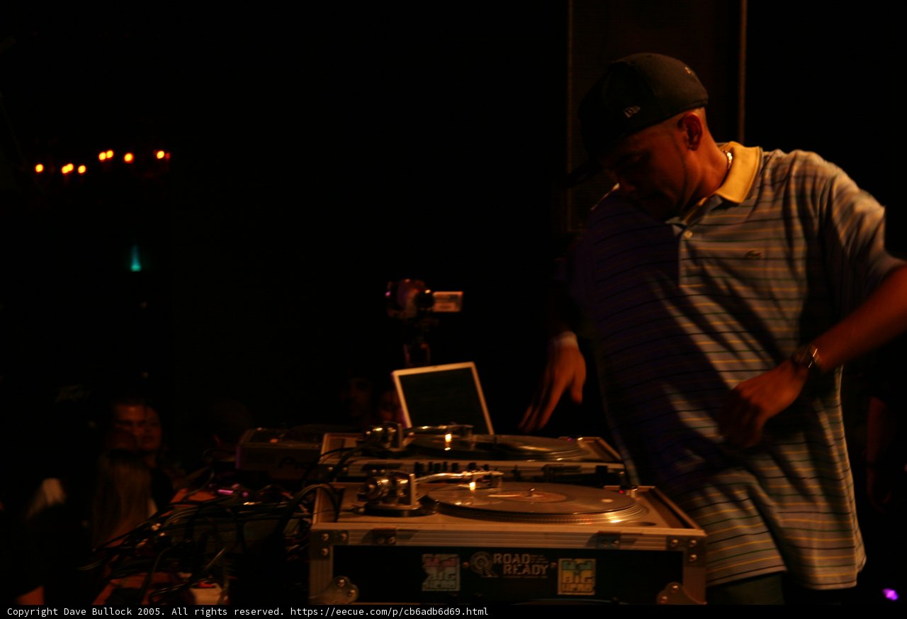 Blue-Shirted Entertainer at Club Performance