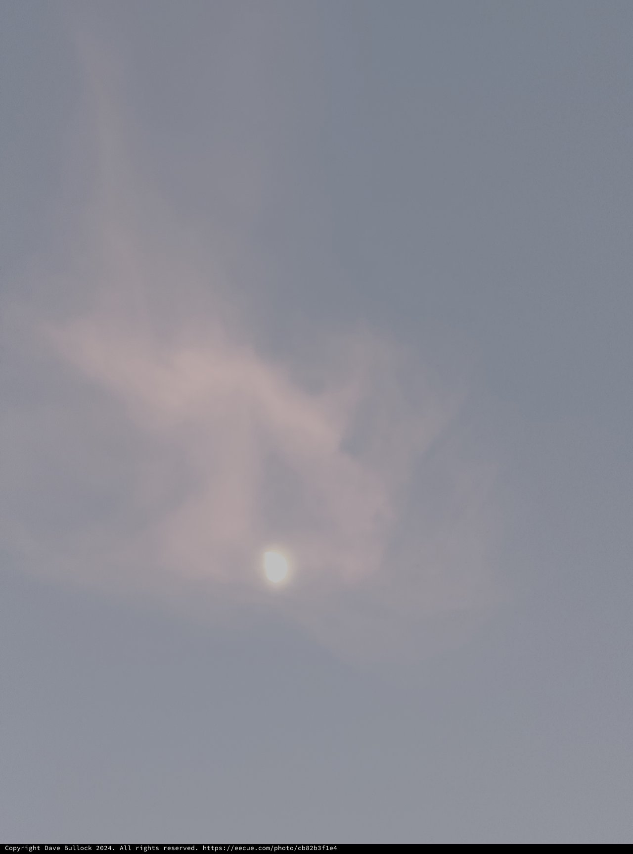 Moon Through Dramatic Evening Clouds