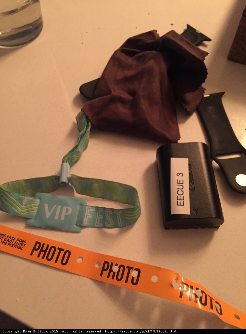 Festival Photography Gear VIP Wristband Photo Pass Canon Battery Apple Watch Lens Cloth Table Still Life Alternate Angle