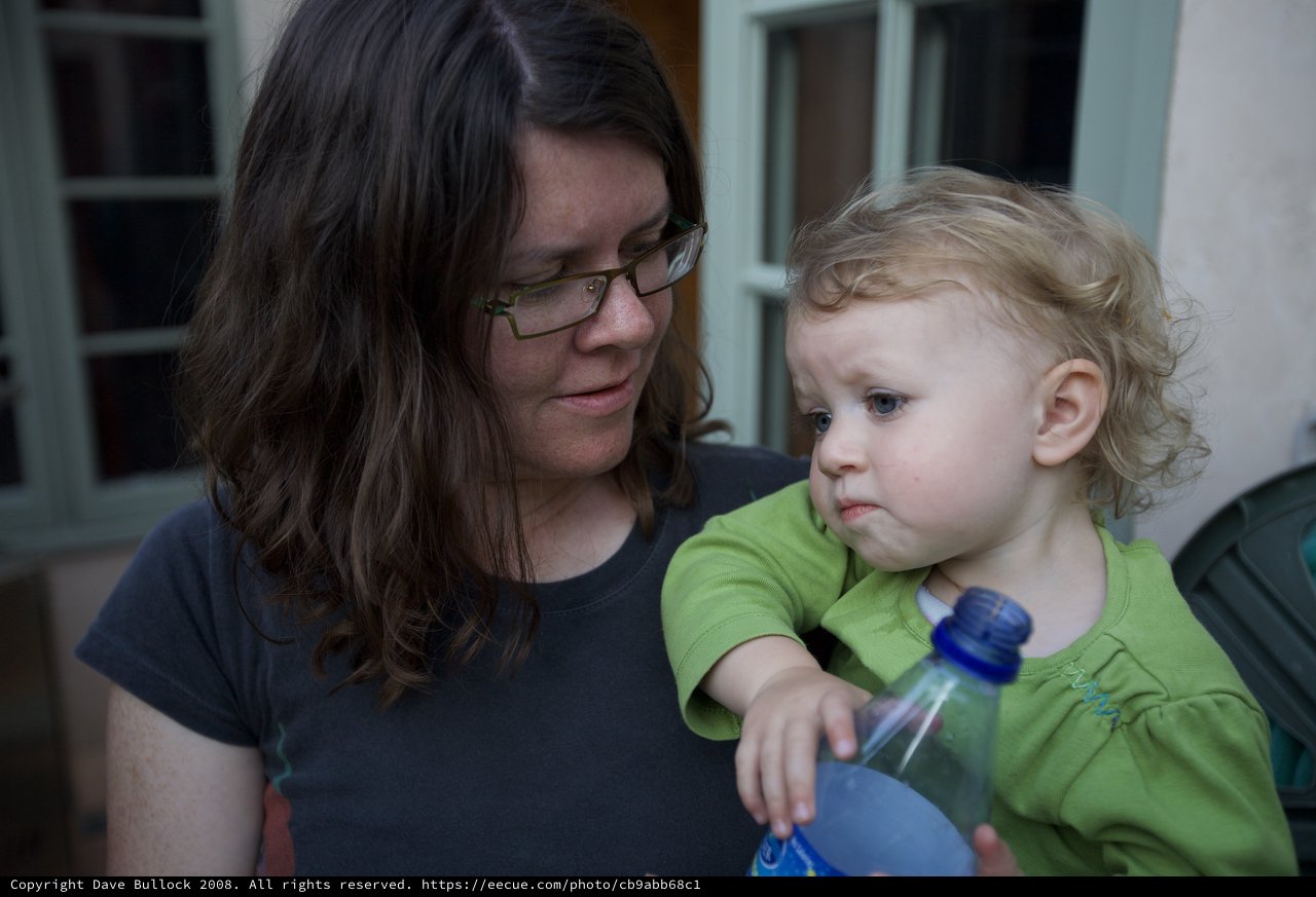 Mother and Toddler Share a Tender Outdoor Moment