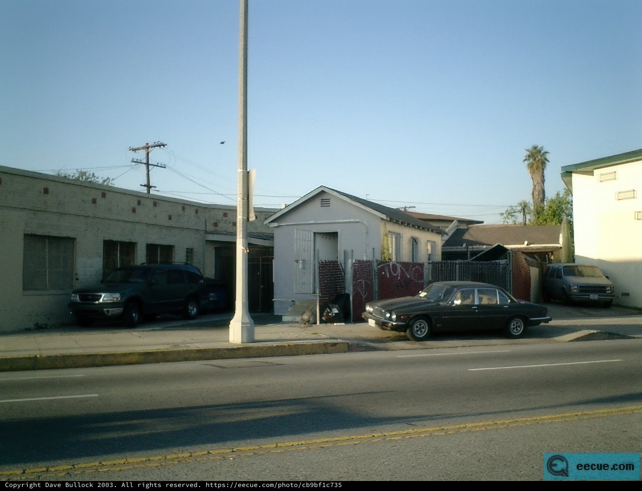 Parked Coupe in Urban Neighborhood