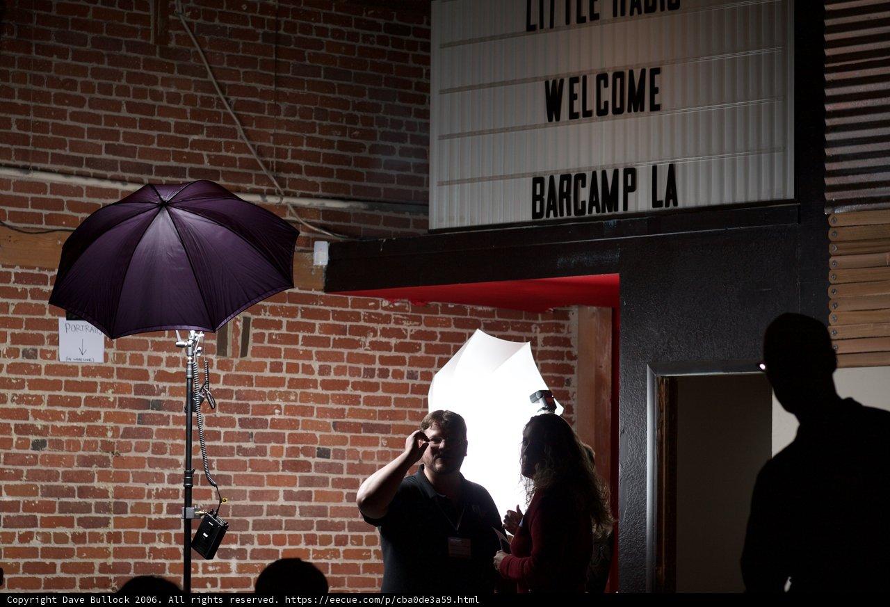 Couple Takes Shelter Under Canopy
