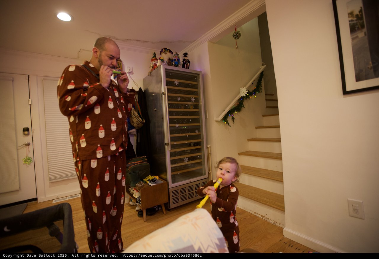 Father and Child's Matching Christmas Morning Fun